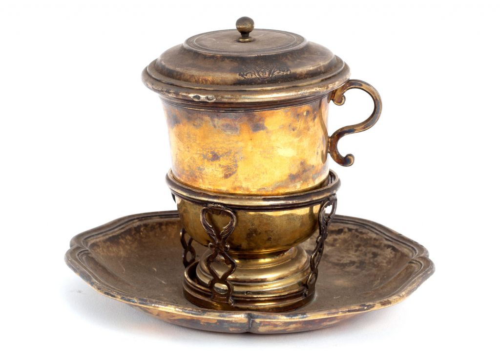 A French silver gilt chocolate cup with holder and saucer