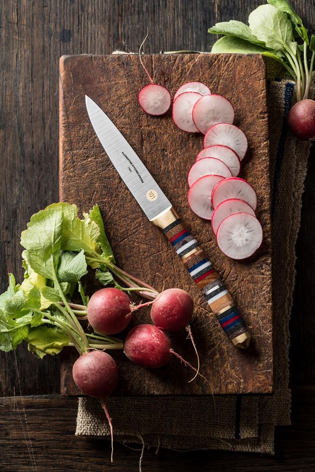 A top down view of one of the knives on a chopping board