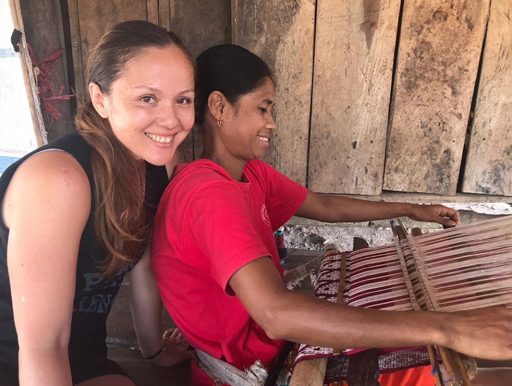 Francisca Turner of Frankitas watching traditional weaving in Indonesia
