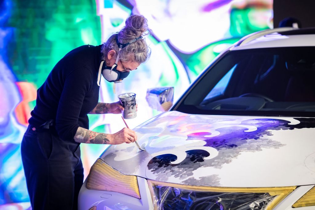 Painting a tattoo on a car