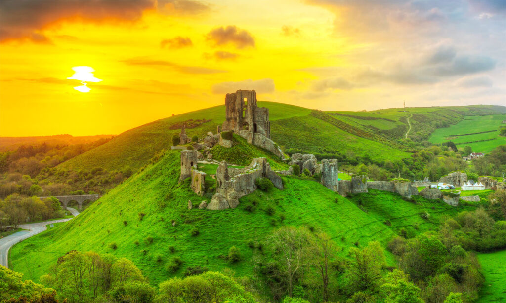 Corfe Castle in Dorset at sunset