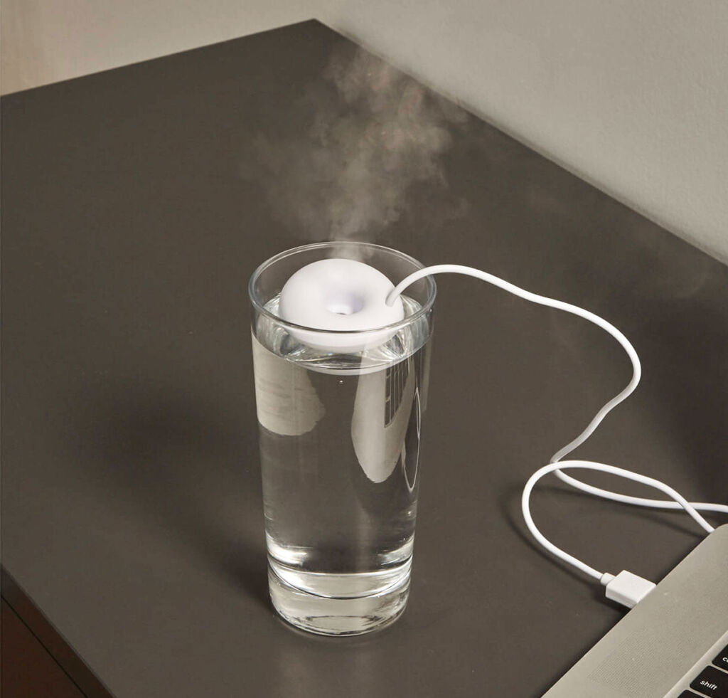 The Floatie Humidifier in a glass of water