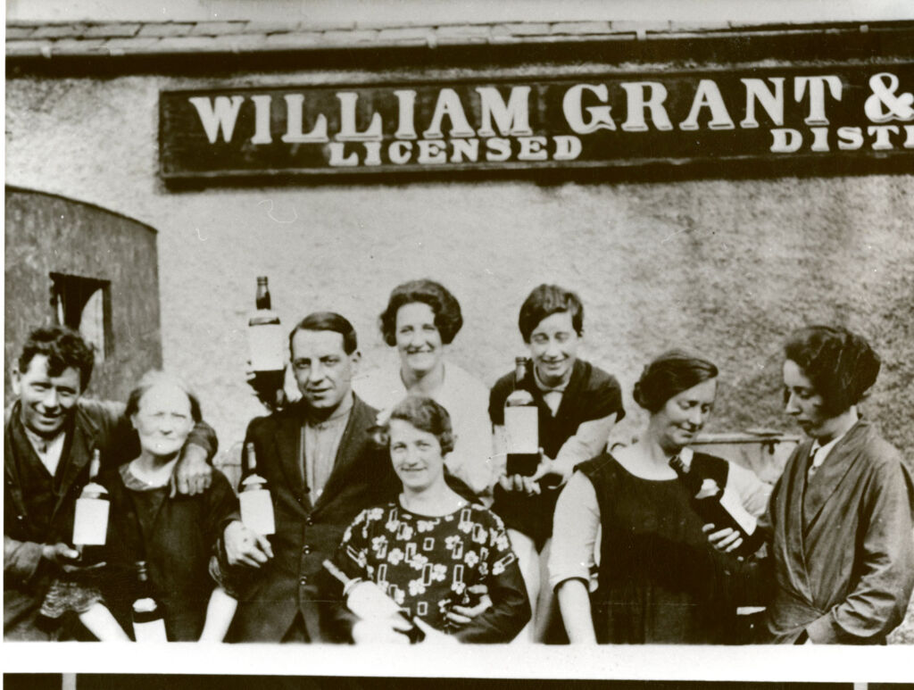 Vintage William Grant photograph showing people enjoying its whisky