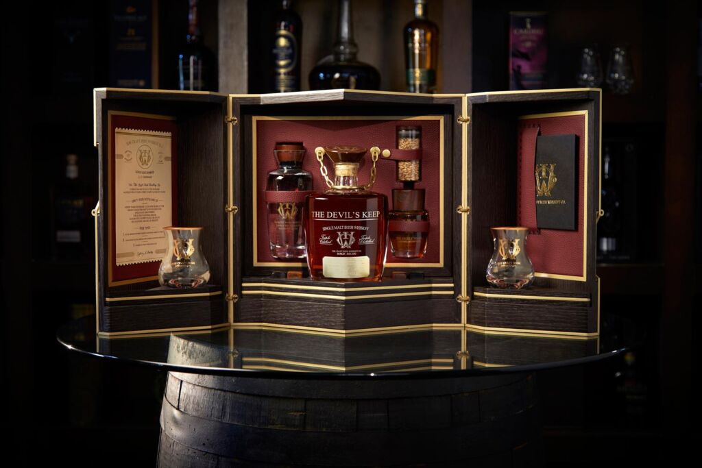 A bottle of Devil's Keep Irish Whiskey inside its spectacular presentation case