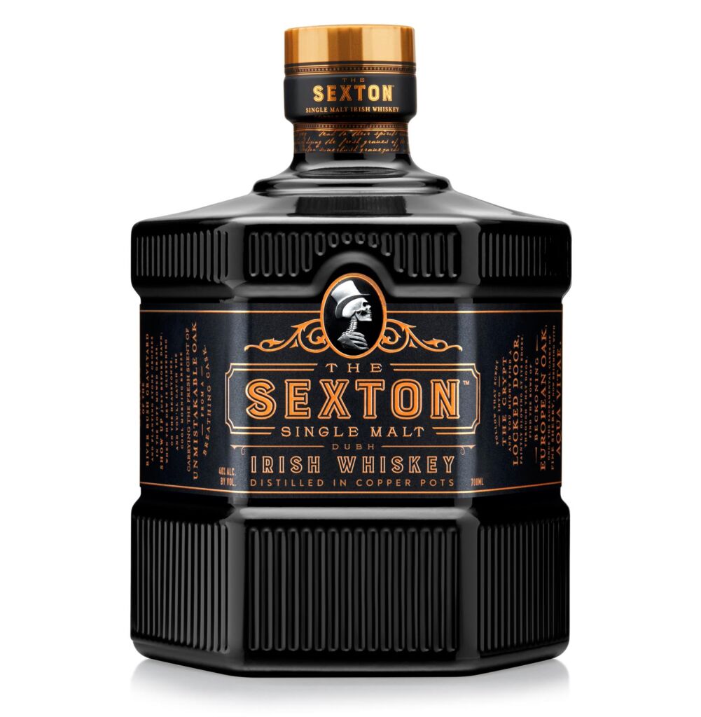 A bottle of The Sexton Irish whiskey displaying the skull image with a top hat
