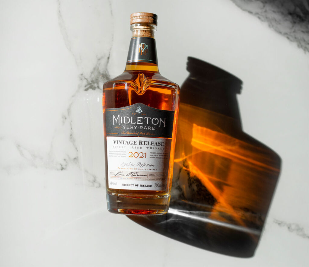 A bottle of Midleton Very Rare 2021 Whiskey on a marble table