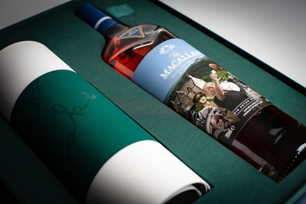 Bottle of Macallans An Estate, A Community and A Distillery in its presentation box