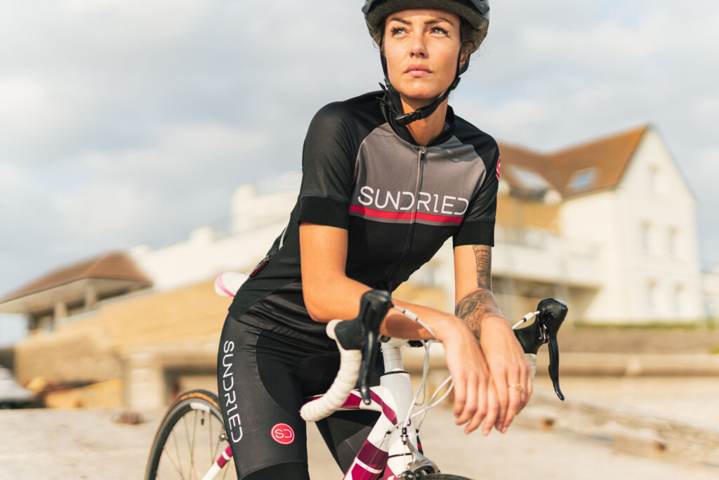Female cyclist wearing Sundried Apparel
