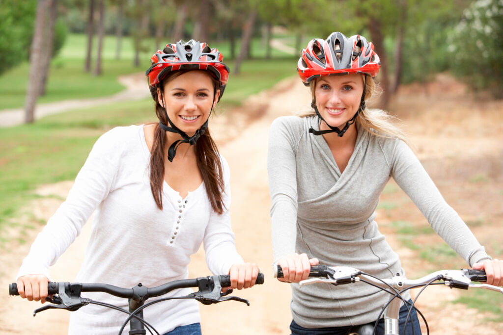 Two women out cycling in the countryside