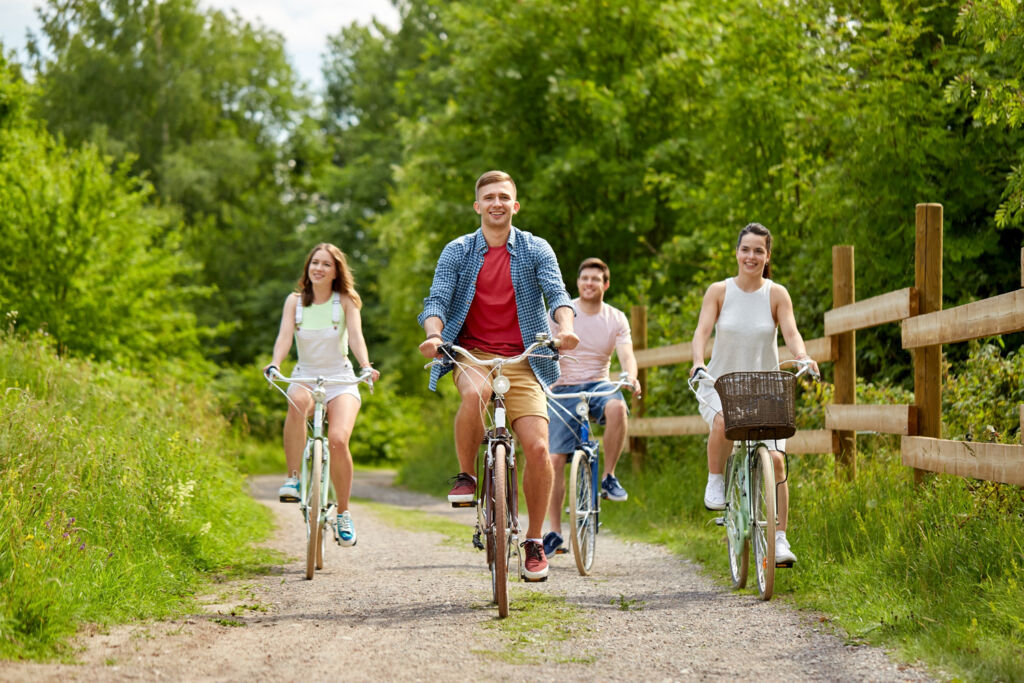 A family enjoying a bike ride in the English Countryside