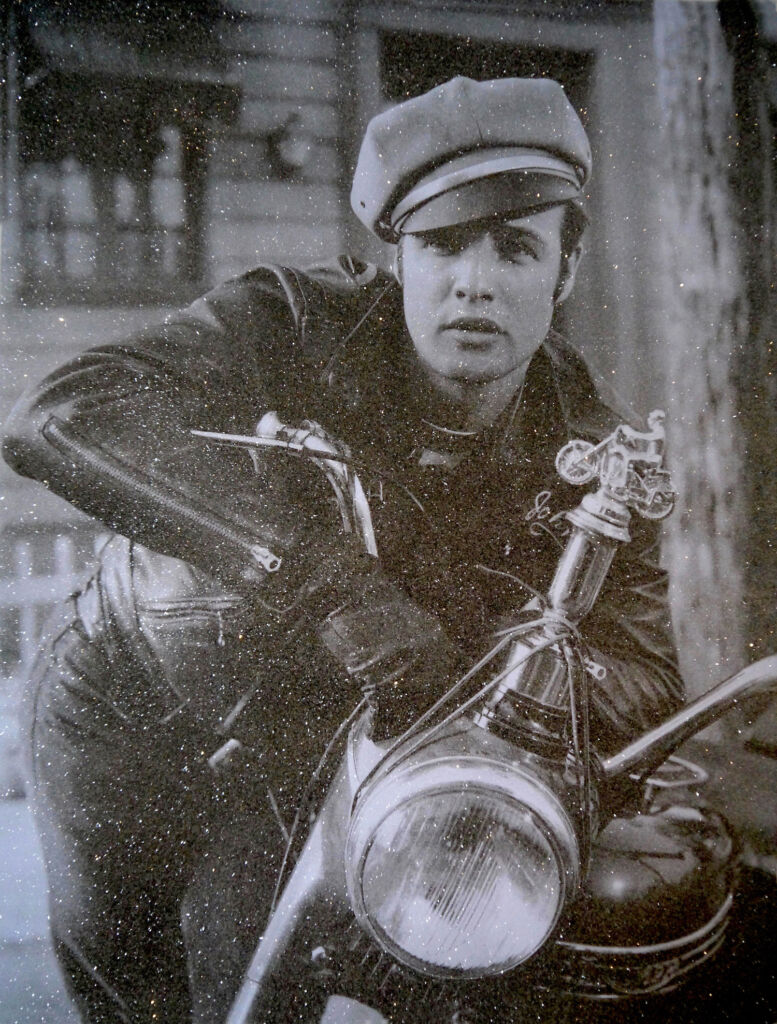 An iconic Marlon Brando print sat astride a motorcycle