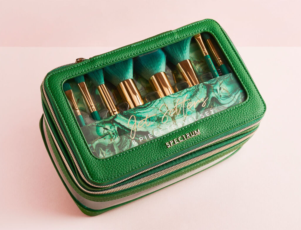 The Spectrum Jet Setter make up brush collection in a green case