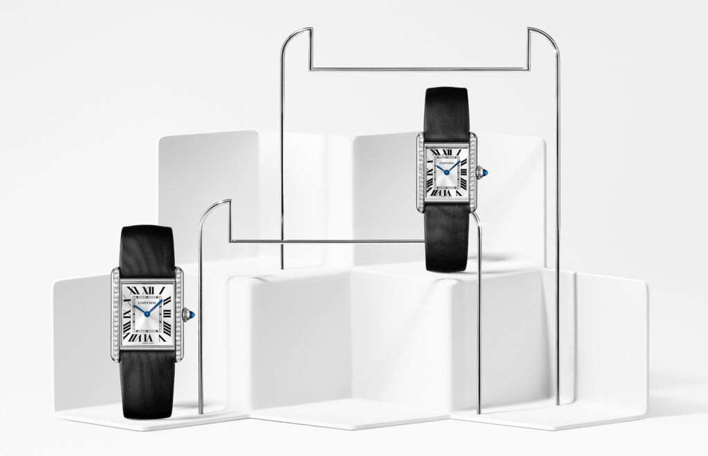 Two of the new models in steel with a diamond paved bezel