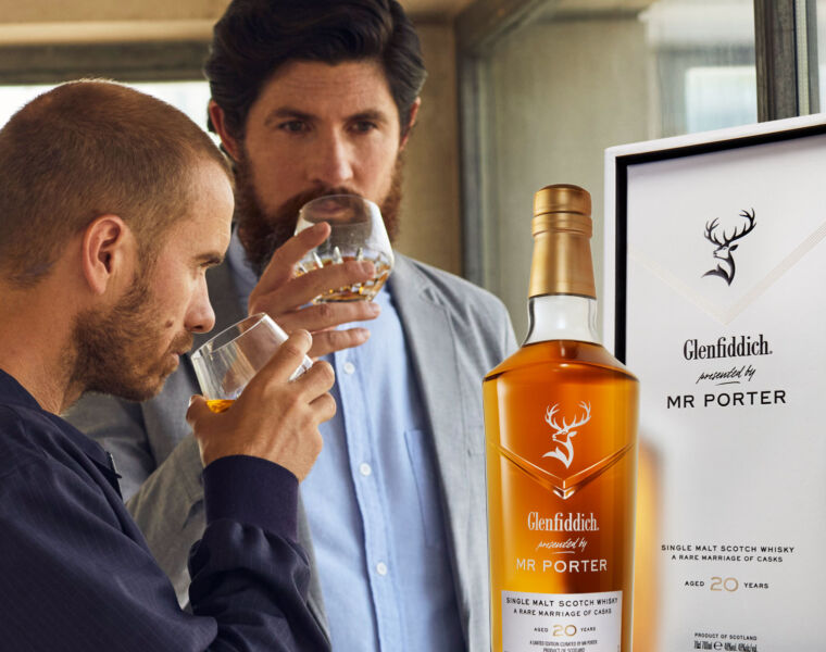 Two men drinking glasses of Glenfiddich presented by MR PORTER