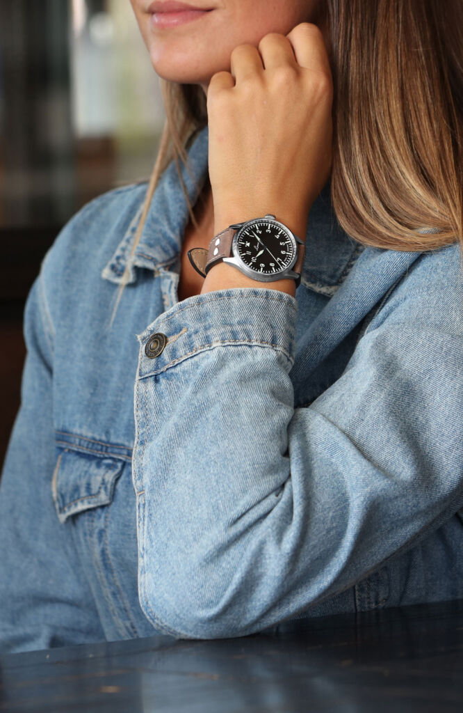 A woman wearing one of the company's new pilot watches
