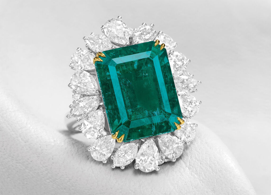 A closeup view of the Natural Untreated Colombian Muzo Emerald and Diamond Ring