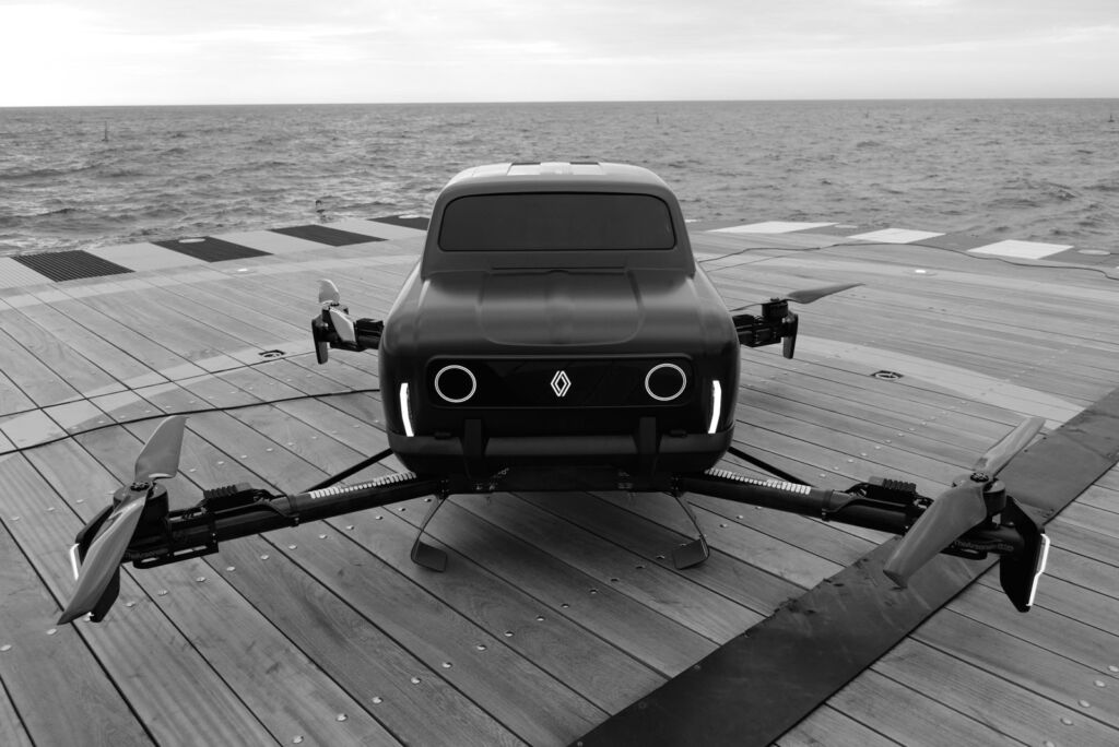 The concept parked on a helipad by the sea