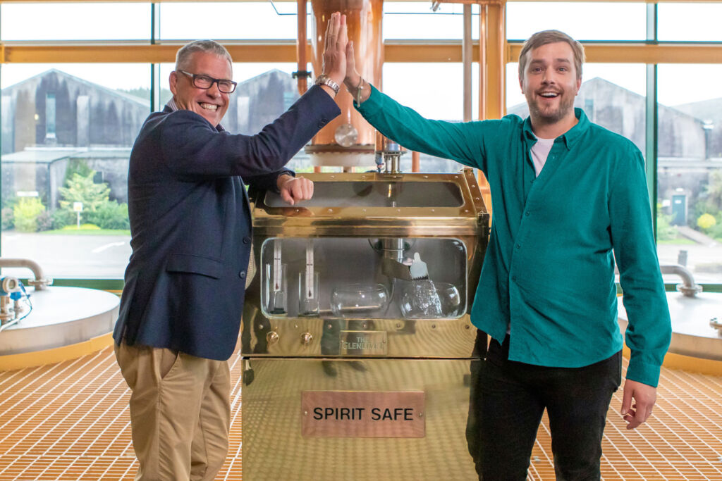 Alan WInchester and Iain Stirling high-fiving for MTV Cribs at The Glenlivet Distillery