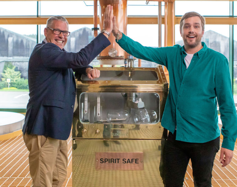 Alan WInchester and Iain Stirling high-fiving at The Glenlivet Distillery