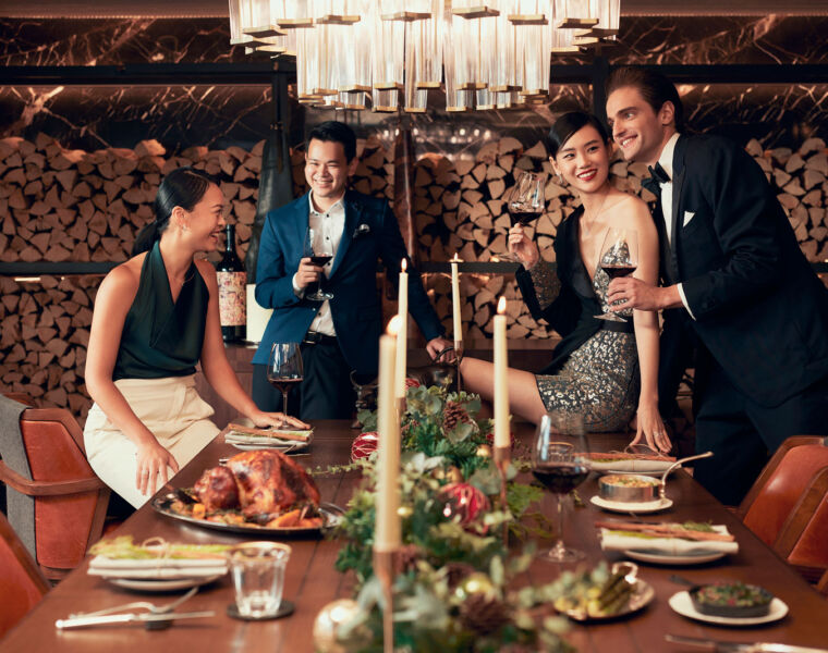 Two couples celebrating the festive period at Rosewood Hong Kong