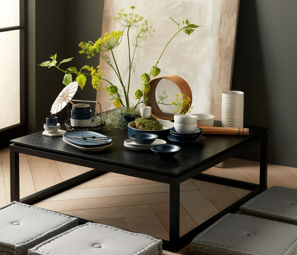 A black wood Japanese table creates helping to boost the look of an interior