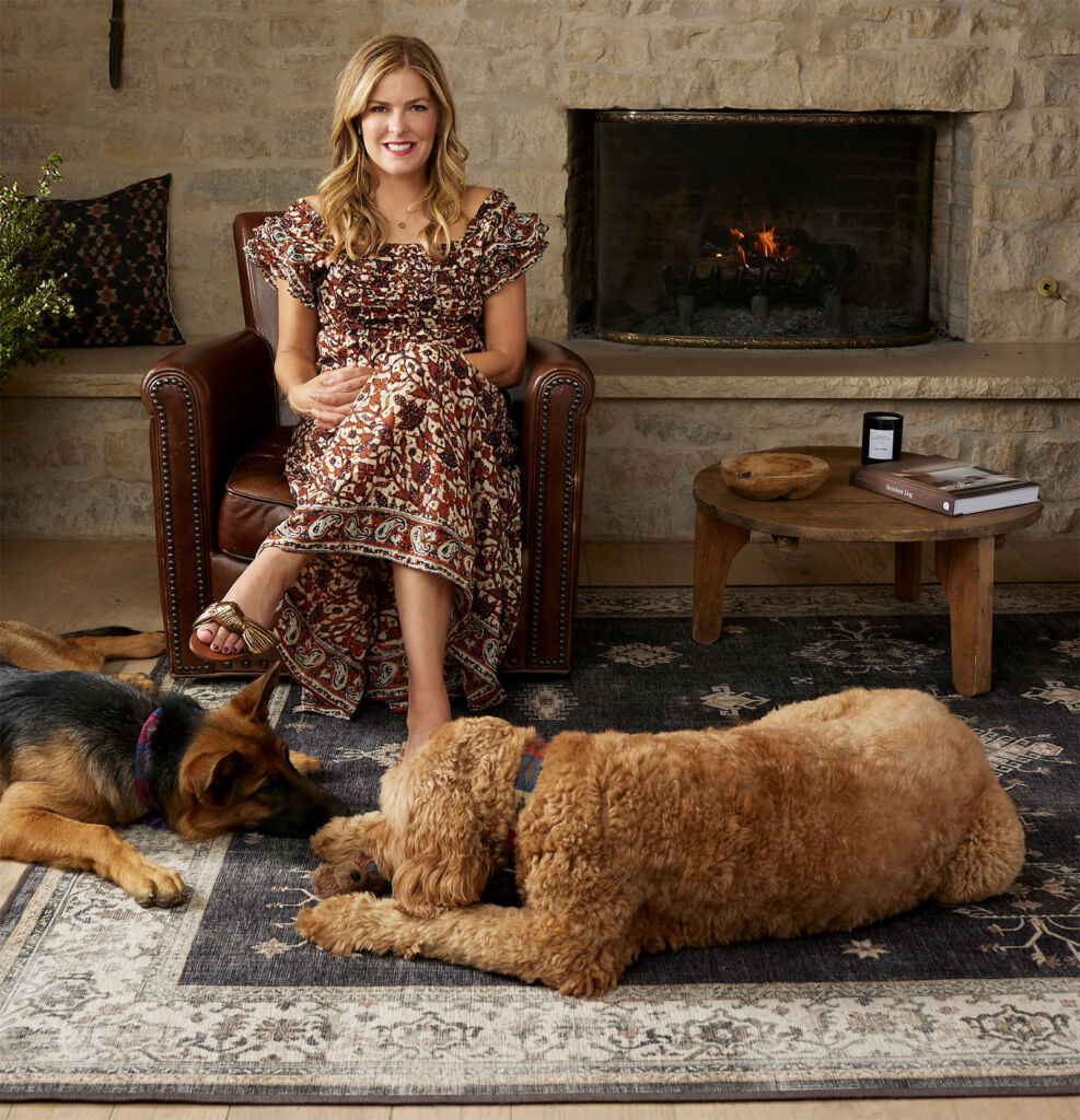 Jeneva, relaxing at home with her dogs