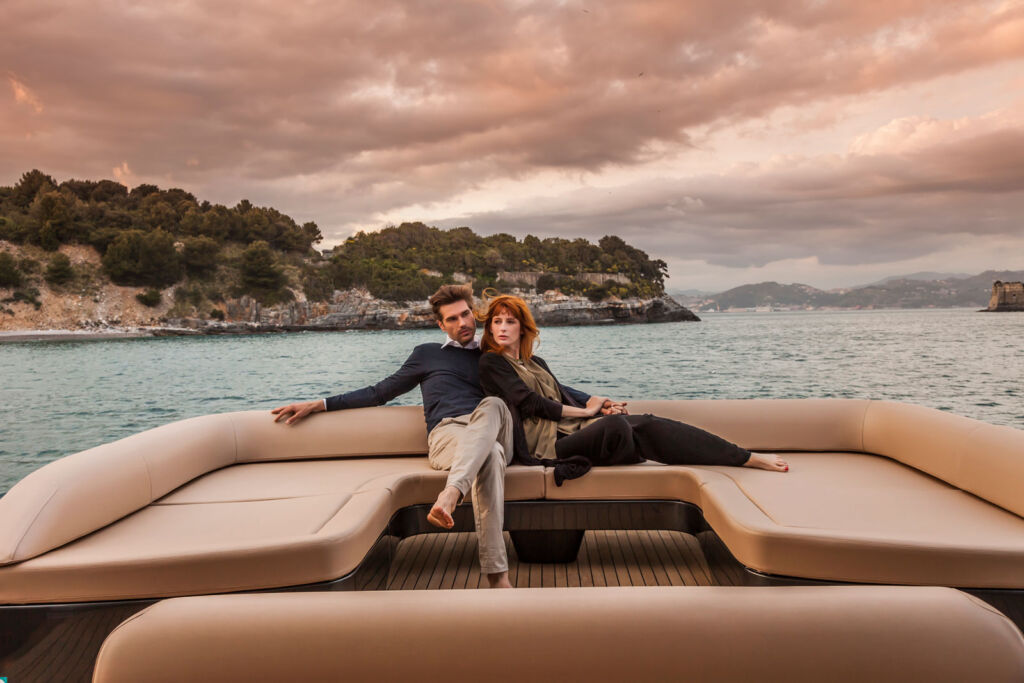Two people relaxing on one of the company's incredible superyachts