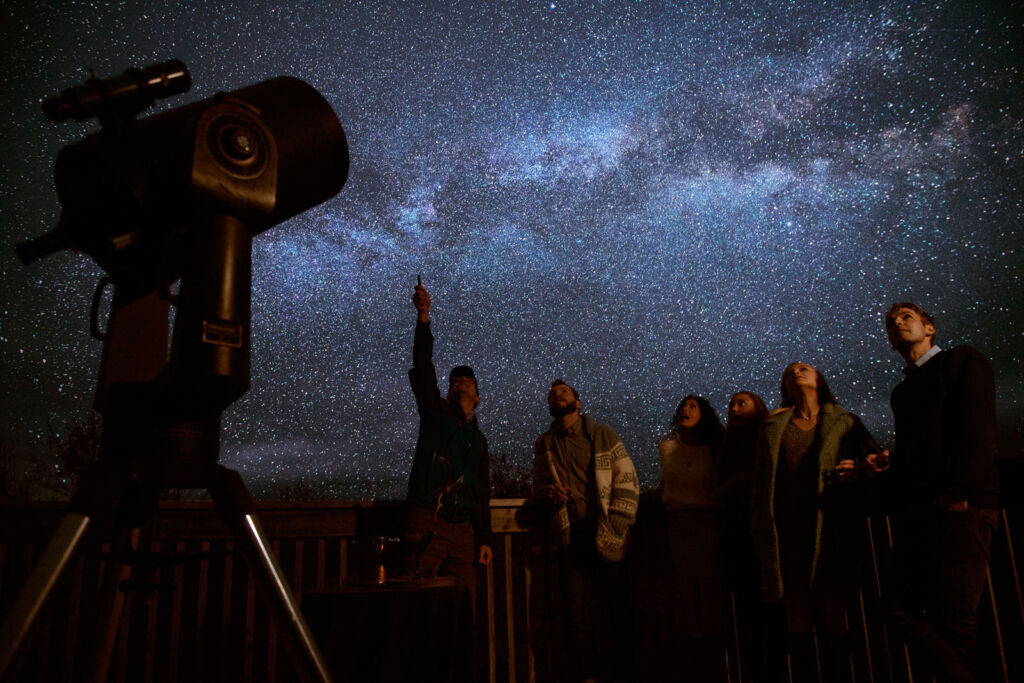 People being educated on the stars at the Deep Sky Eye Observatory