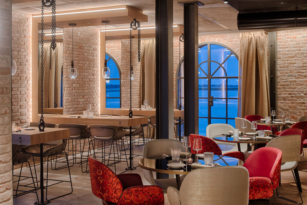 Inside the Venezia Murano Villa hotel's restaurant with views over the lagoon