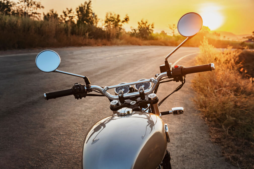 Watching the sun set on a vintage motorcycle