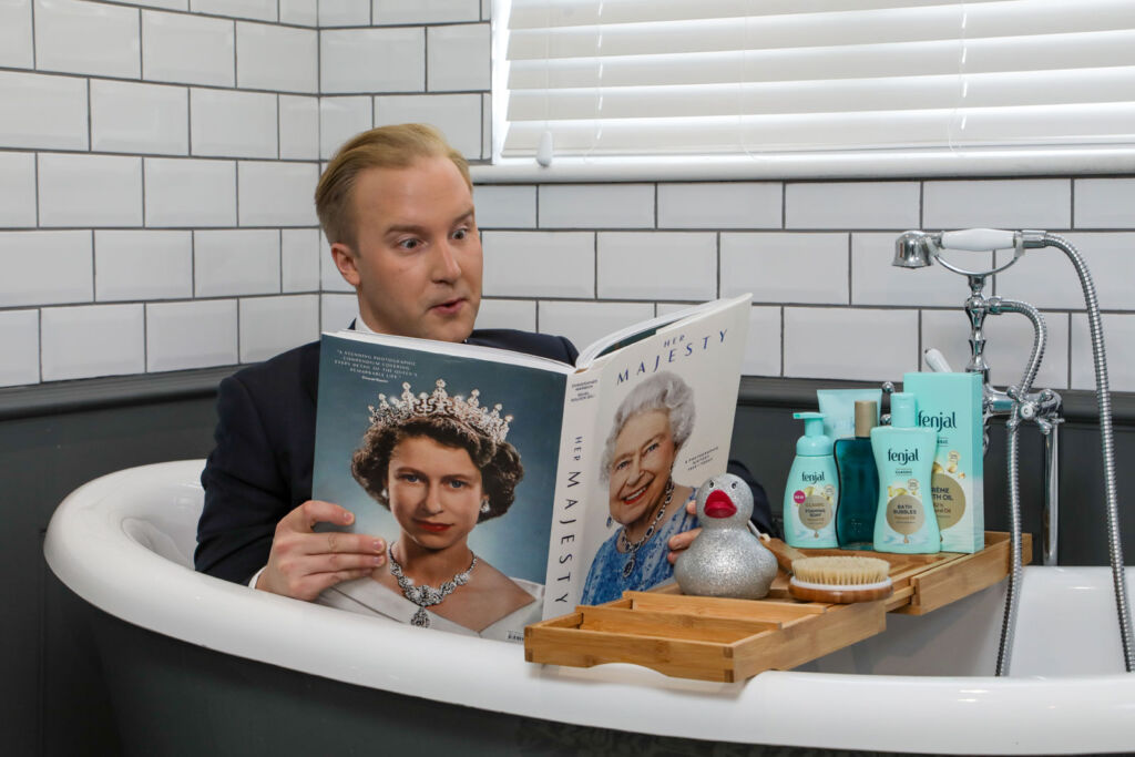William reading in the bath