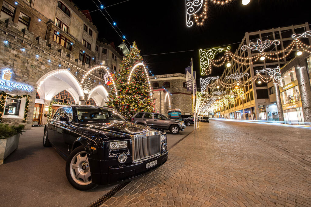 A Rolls-Royce motor car outside Badrutt's Palace Hotel at Christmas