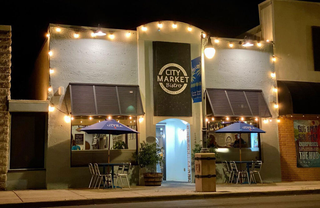 The exterior of the City Market Bistro at night