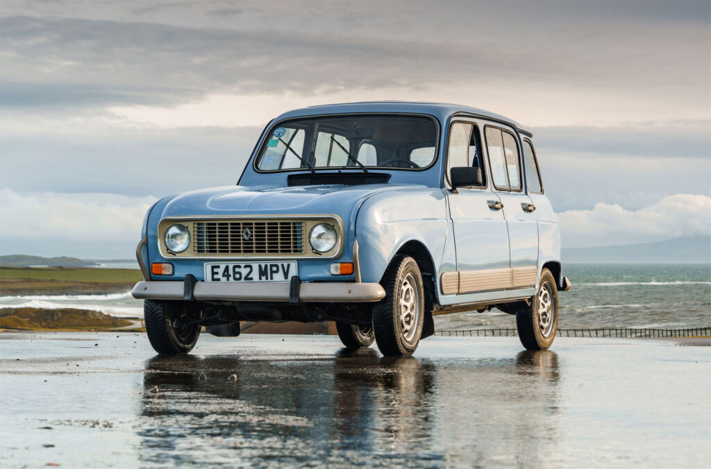 An E registration Renault 4 by the sea