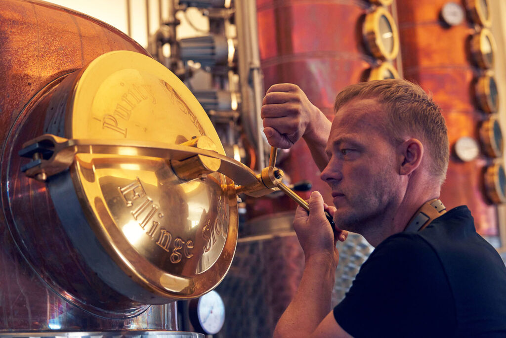 Stefan Magnusson inspecting one of the copper stills