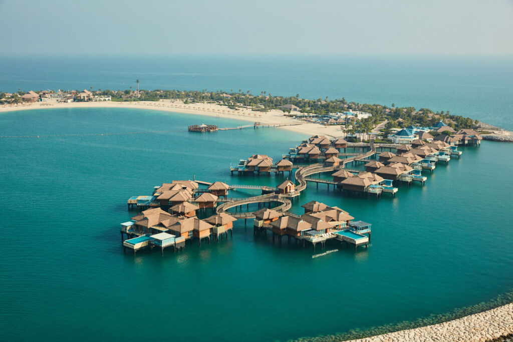 An aerial view of the over water villas at the Banana Island Resort