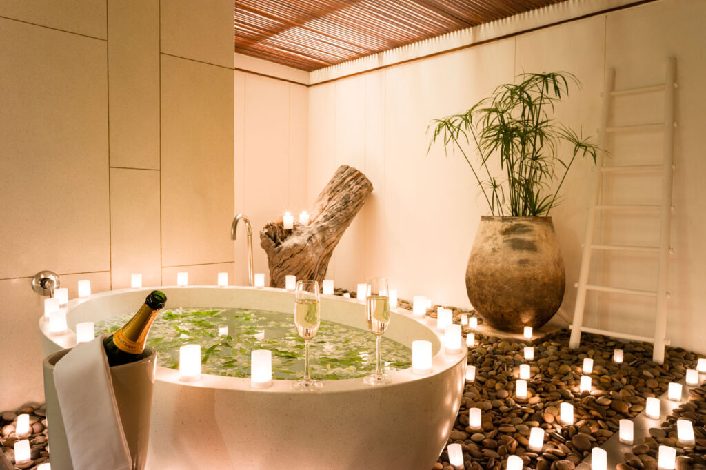 A romantic themed bathroom at The Sarojin in Thailand