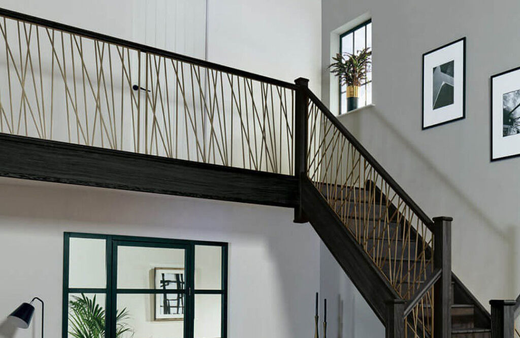 A wood and brass staircase installed by the company