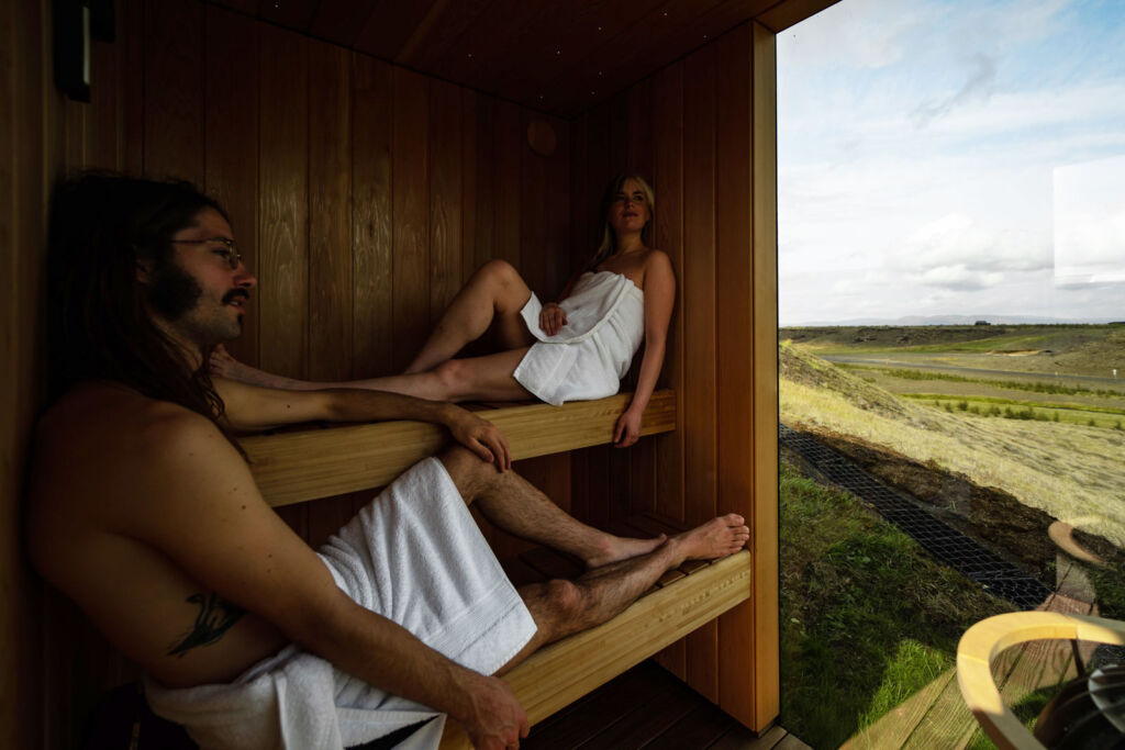 A couple relaxing in one of the saunas