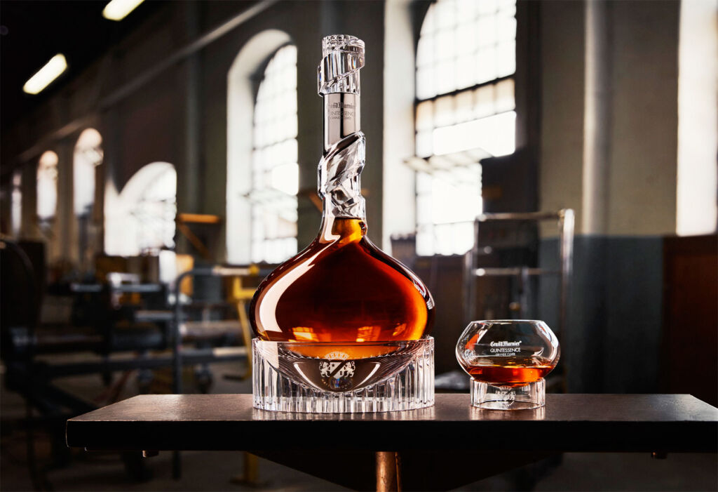 Grand Marnier Grand Cuvée Quintessence on a table with a curved glass