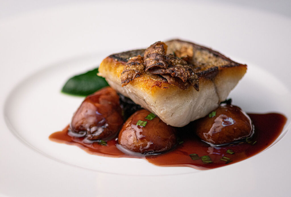 We talk to Anjana Pandya, Managing Director at St. James' Hotel & Club 20 Griddled South Coast Line Caught Fillet of Seabass, Braised Jerusalem Artichokes, Parsley Purée, Wild Mushrooms, Red Wine and Tarragon Jus.