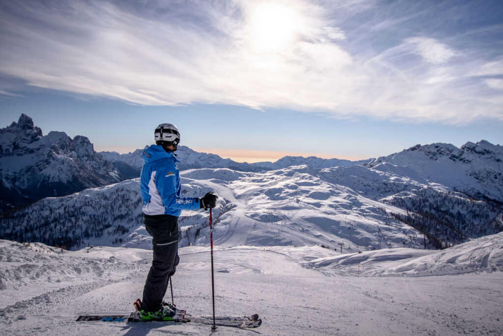 A skier admiring the views on the Trentino slopes