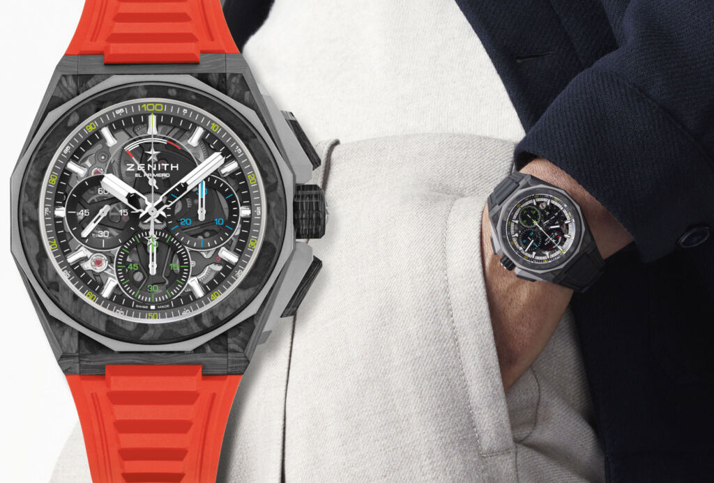 A close up view of the Defy Extreme Carbon with an orange strap