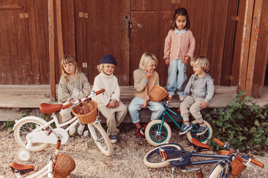 A group of children with their Banwood bicycles