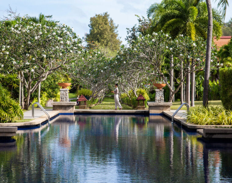 A guest walking around the Banyan Tree Veya Phuket grounds