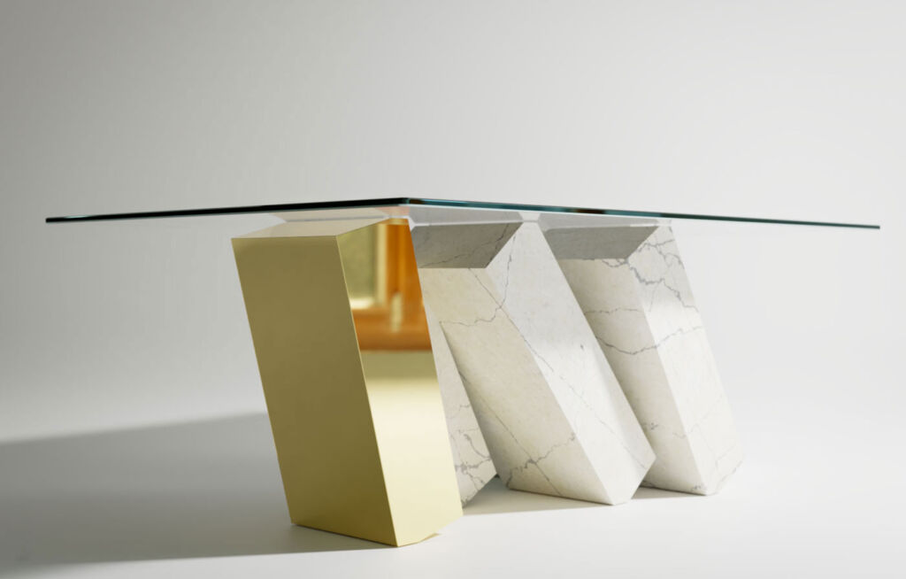 The table with white veing marble slabs and one single gold coloured slab
