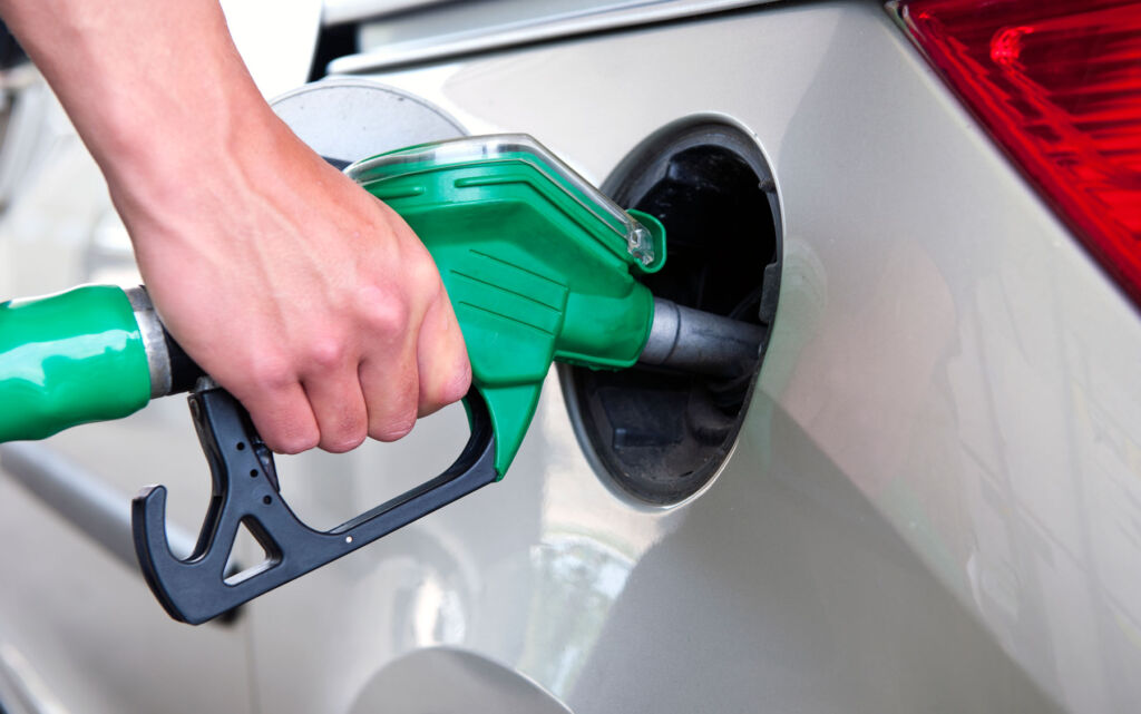 Filling up a car with unleaded petrol