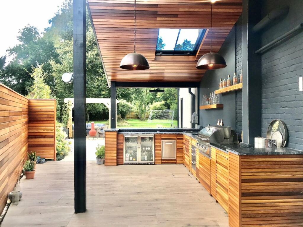 An outdoor kitchen with a roof structure