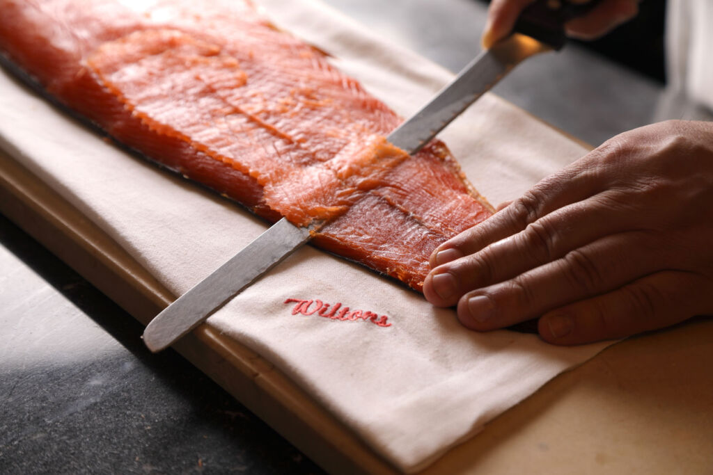 Smoked Salmon being Sliced at Wiltons Restaurant