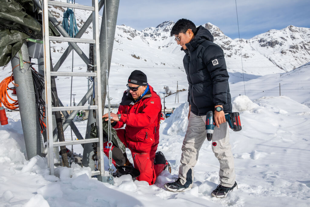 Team members working on the glacier project